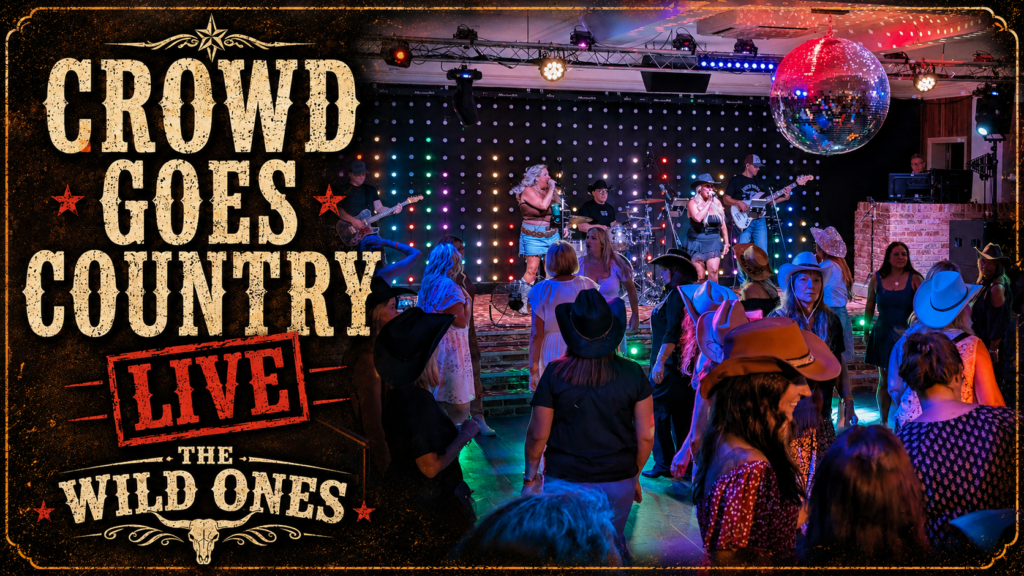The Wild Ones Country Band performing live to a packed crowd at a UK country music event